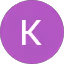 Violetti ympyrä, jossa valkoinen kirjain K.